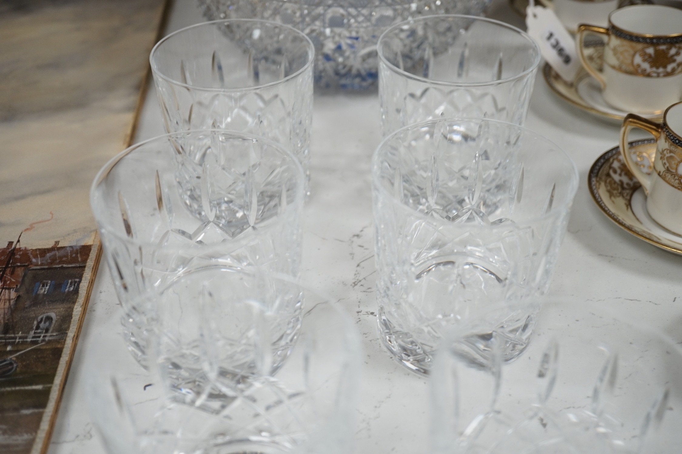 A Pair of Bohemian or Czech heavy cuts glass fruit bowls with blue flashed centres, 22.5 cm diameter, two decanters and six tumblers.